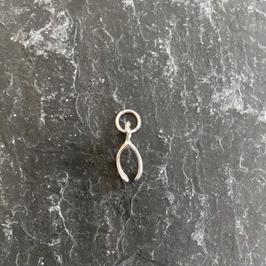 Silver wishbone charm